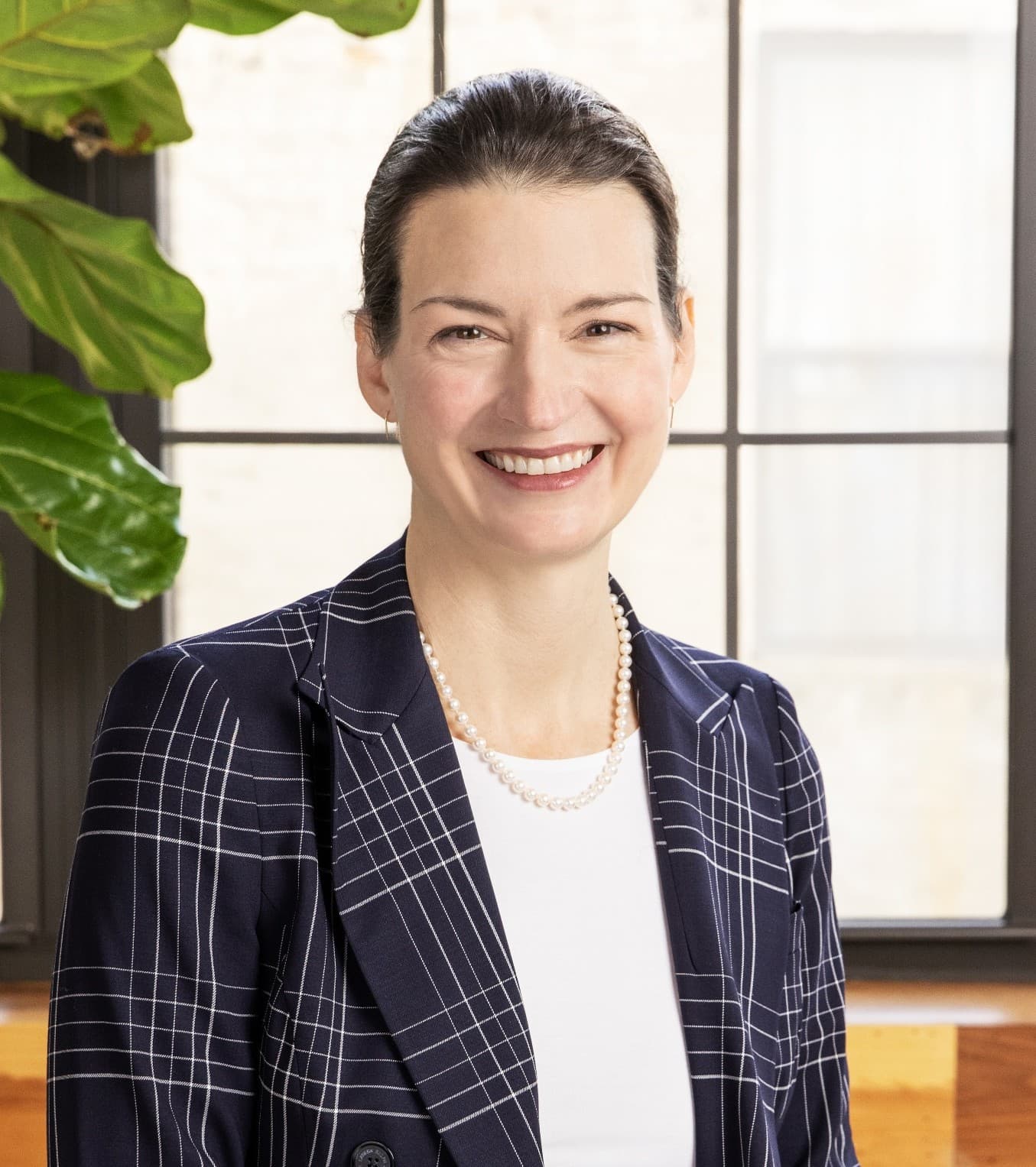 Linda Findley smiling in a green top.